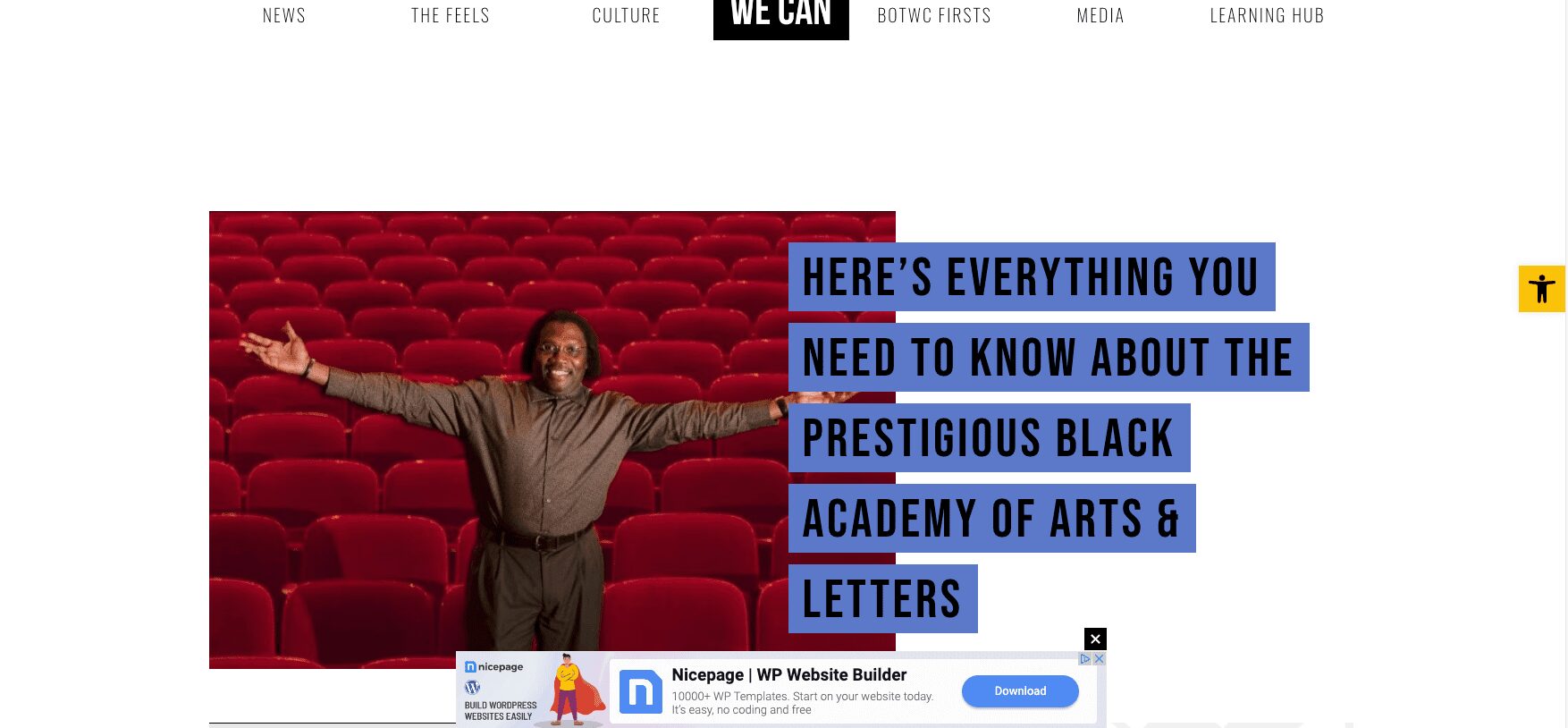 Person standing in empty red theater seats